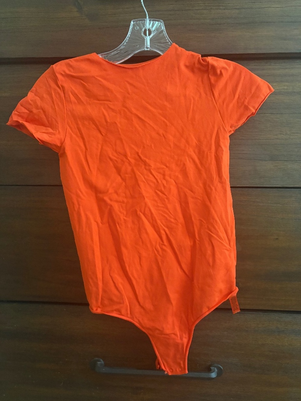 Orange bodysuit